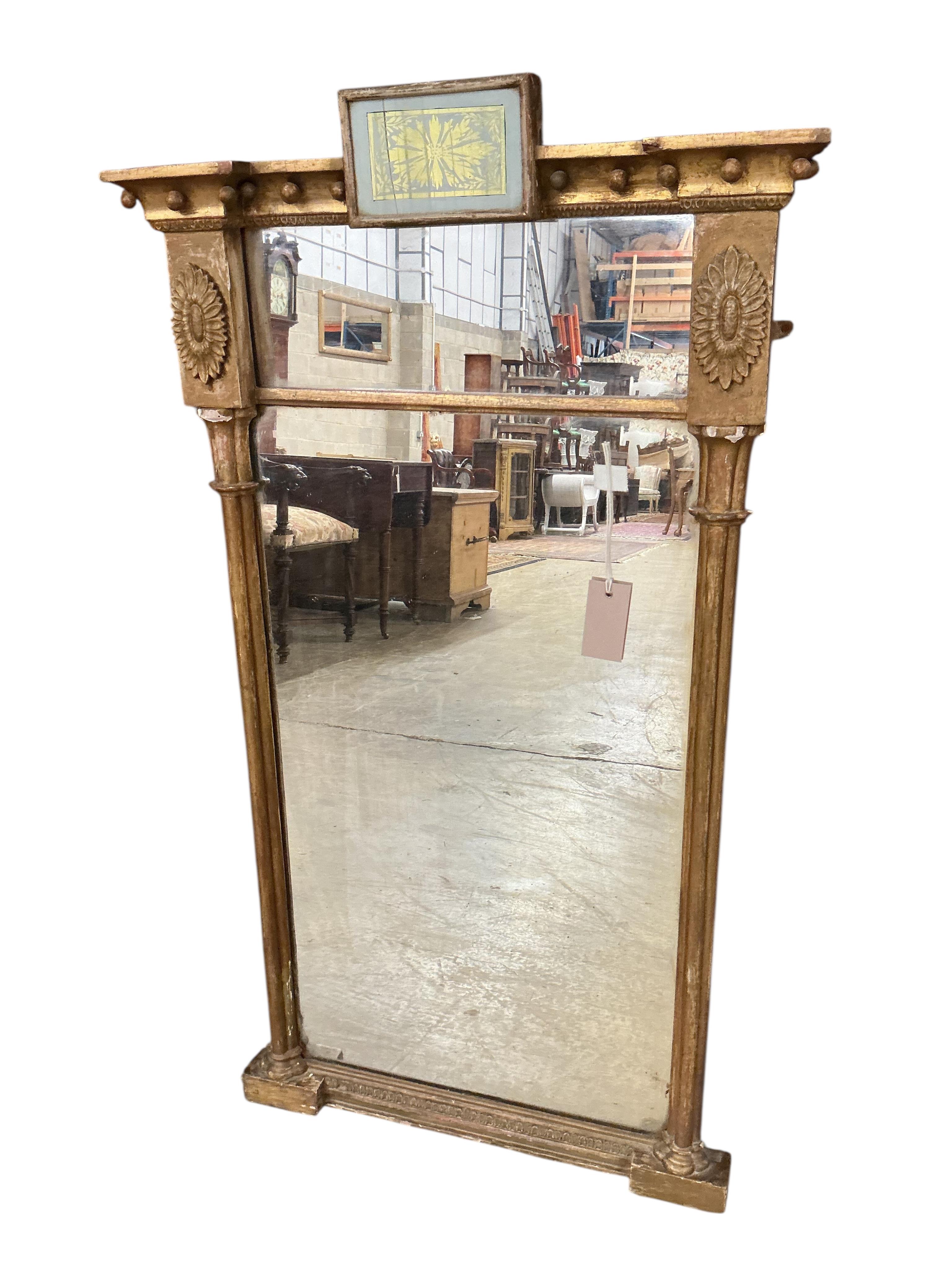 Two Regency giltwood and composition pier glasses, larger width 55cm, height 102cm